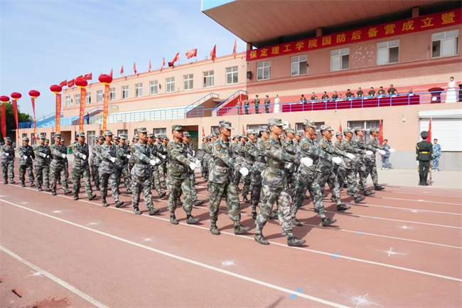 AC米兰中文官方网站隆重举行“国防后备营”成立暨授旗仪式